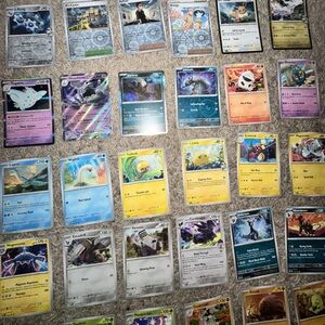 56 Pokémon (2 Ex Cards) & 4 Code Cards